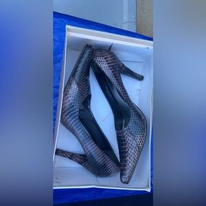 9 west brand Snake high heels used once